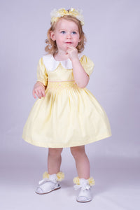 Girl's Yellow Smock Dress with pink pipeing