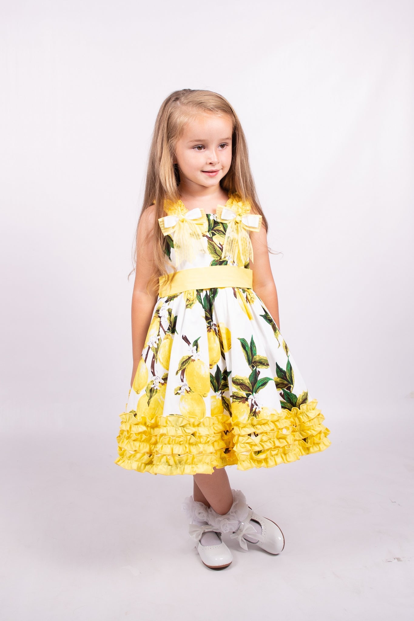 Girl's Lemon print dress with Bows and frills